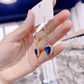 🎁Ideales Geschenk – Exquisite blaue Herz-Ohrringe mit synthetischen Edelsteinen