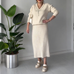 Elegantes zweiteiliges Set aus Pullover und Rock mit Strassschleife für Damen