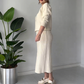 Elegantes zweiteiliges Set aus Pullover und Rock mit Strassschleife für Damen