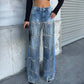 Damenjeans mit Pailletten und Quasten