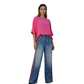 Lebendige rosa Bluse und Hose mit auffälligem Leopardenmuster