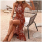 Halterkleid mit Schlitz und Blumenmuster