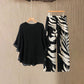 Elegantes, fließendes Oberteil und bedruckte Hose Set von Wemon