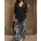 Damen-Set aus V-Ausschnitt-Bluse und bedruckter Weithose