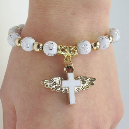 🎁Pulsera cruz con alas de ángel